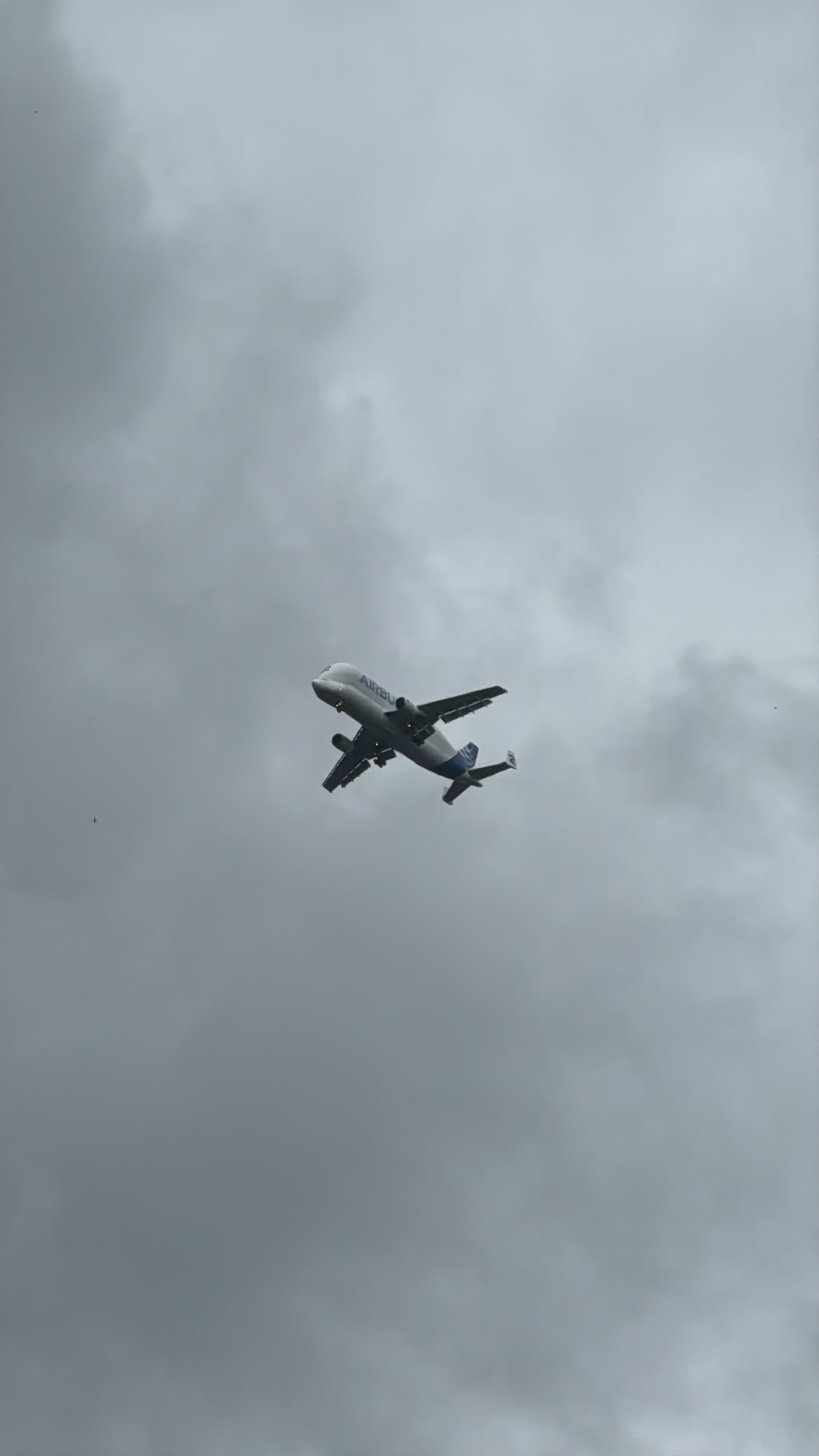 Airbus BelugaST F-GSTB viewed from below against a cloudy sky