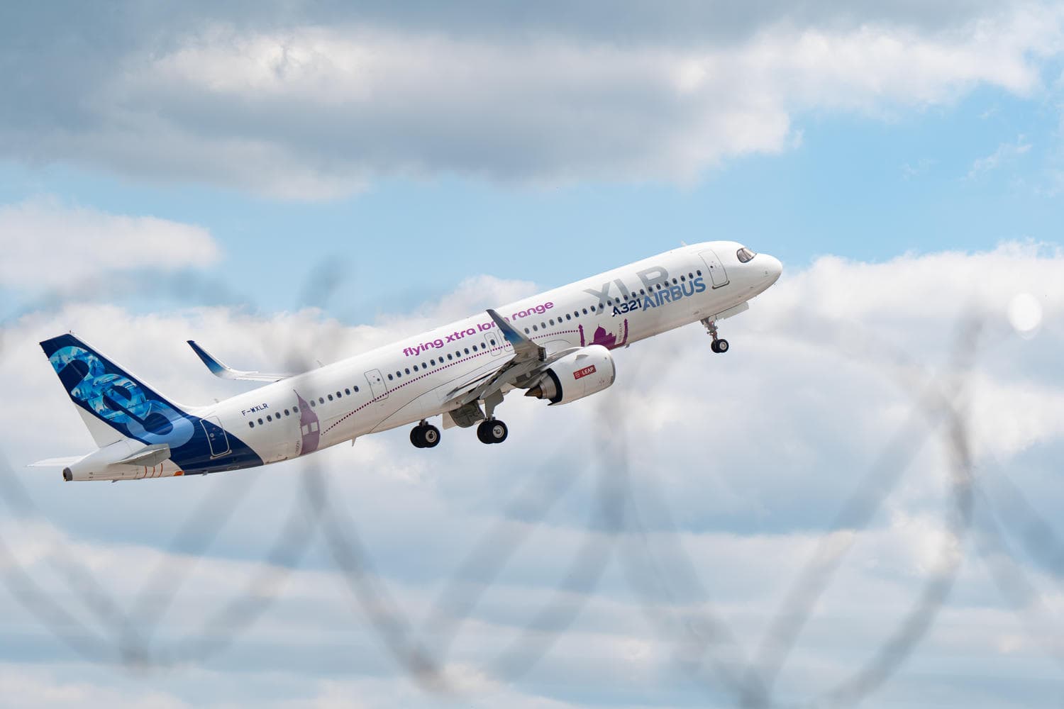Airbus A321XLR test aircraft taking off in QR code livery
